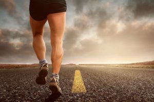 Men running on the road