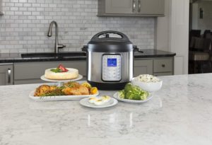 Instant Pot Duo Plus 9-in-1 Multicooker on the table